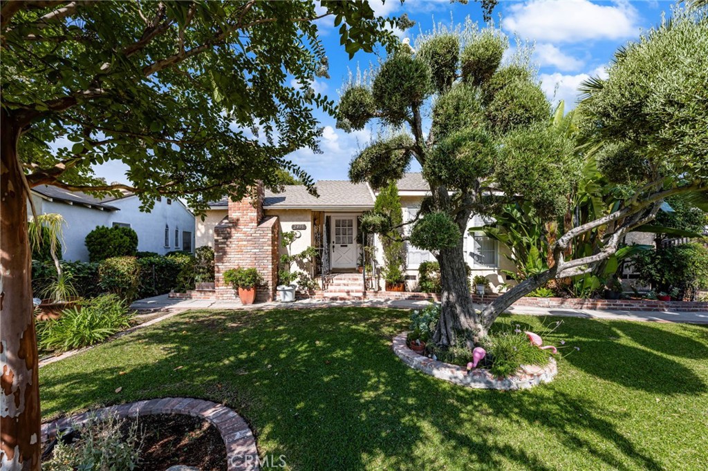 First time on the market in almost 60 years! Nestled in the highly sought-after Mayflower Village neighborhood of Monrovia, this lovingly maintained three-bedroom, two-bath home is a rare find—offering a perfect blend of charm, comfort, and functionality. From the moment you arrive, the incredible curb appeal and tranquil, manicured landscaping with mature fruit trees set the tone for the beauty within.
Step inside to a sun-filled living room with a cozy fireplace, a tastefully remodeled kitchen with breakfast bar, and a welcoming dining area—ideal for gathering with family and friends. The spacious family room overlooks an expansive covered patio, creating the ultimate indoor-outdoor flow for entertaining or relaxing in your own private retreat.
The oversized garage, plentiful storage, and generous parking space (perfect for multiple vehicles, RV, or toys) add everyday convenience, while stunning mountain views provide the perfect backdrop to your new home. This is a truly special property you won’t want to miss!