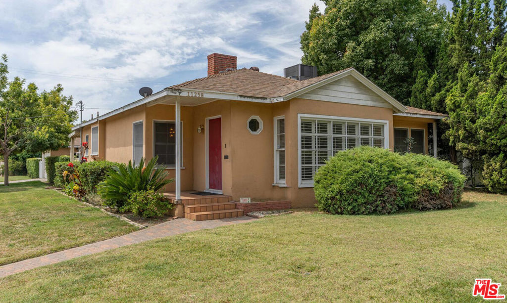 A true diamond in the rough! Ranch style fixer located in Toluca Lake/North Hollywood sitting on a spacious 8,250 sqft corner lot brimming with potential and character! Full of personality, this 3 bed 2 bath home invites you to a well appointed living space boasting a large bay window, decorative fireplace, formal dinning, eat-in kitchen. Including 3 generous rooms with ample built-in storage. All with endless possibilities. The landscaped front and backyard is perfect for all entertainers at heart. Featuring an enclosed backyard with privacy hedges, built-in pool and covered back patio perfect for outdoor gatherings. Detached garage offers additional creative space! All nestled in the highly sought after Toluca Lake - NoHo Arts District neighborhood, an art lovers delight! Convenient access to world class restaurants & theaters. Close to parks, recreational areas and top-rated schools. This property offers a fantastic opportunity for those with a vision - with a timeless foundation and classic architectural details, it awaits your personal touch to transform into your dream home. Don't miss out on this great opportunity to make your vision come to life!