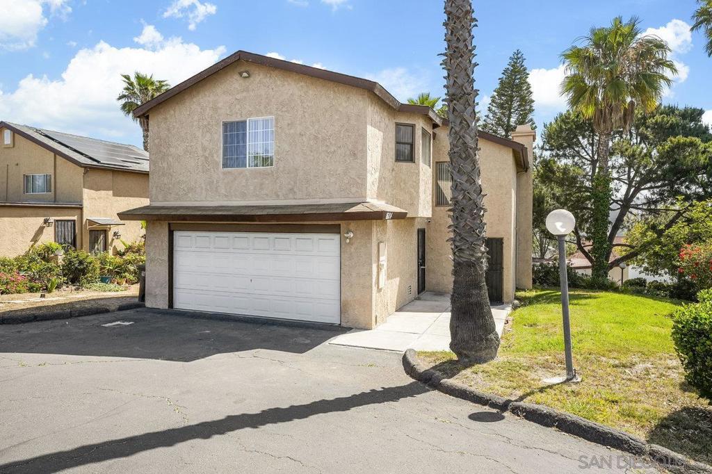 Welcome to this beautifully designed 4 bedroom, 3.5 bath detached home located in the sought-after My View community of Spring Valley. Offering 1,807 square feet of living space and a 2-car garage, this home blends comfort, functionality, and scenic charm. The main floor features an open-concept layout connecting the living room and kitchen, ideal for entertaining and daily living. A convenient first-floor bedroom and half bath offer flexibility, with the potential to convert the bath into a full for added value and convenience. Upstairs, the oversized primary suite provides a spacious retreat, complemented by two additional generous-sized bedrooms and two full bathrooms. One of the secondary bedrooms includes its own private deck—perfect for enjoying peaceful valley views. Located just minutes from major freeways, this home offers easy access to everything San Diego has to offer.
