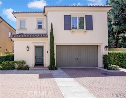 Highly upgraded, bright & airy home in the sought-after community of Cypress Village! 3 spacious bedrooms + computer niche area upstairs, 2.5 baths, 2 car attached garage, big and private backyard with a California room! This end-unit home features extensive upgrades including Engineered wood flooring throughout, plantation shutters, stainless steel appliances, Quartz counters with custom tile full back-splash, and a generous sized Center Island with seating. Kitchen has cabinets with self-close drawers, a walk-in pantry with built-in pocket door. Grand master bedroom with a huge walk-in closet. Master bath features dual sink vanities and a soaking tub. Individual laundry room upstairs. The covered California Room offers a relaxing indoor/outdoor space. The home offers proximity to award-winning Irvine Unified schools, resort-inspired amenities, permanently protected parks, scenic trails and open space and easy access to 5 & 133 Freeway and shopping.