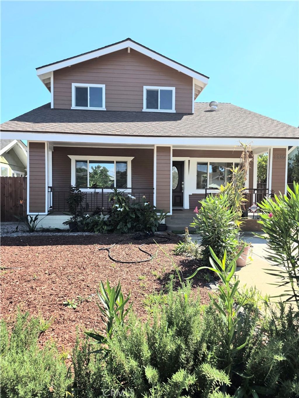 Photo of 1330 W 48th St, Los Angeles, CA 90037 (MLS # MB26069011)