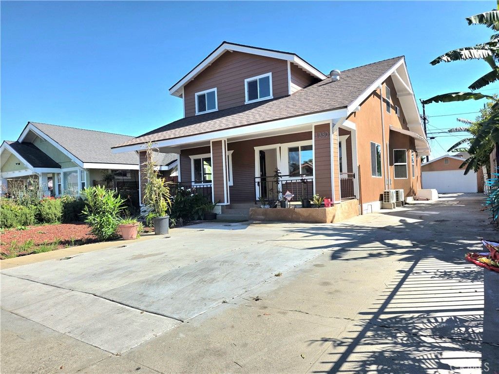 Photo of 1330 W 48th St, Los Angeles, CA 90037 (MLS # MB26069011)