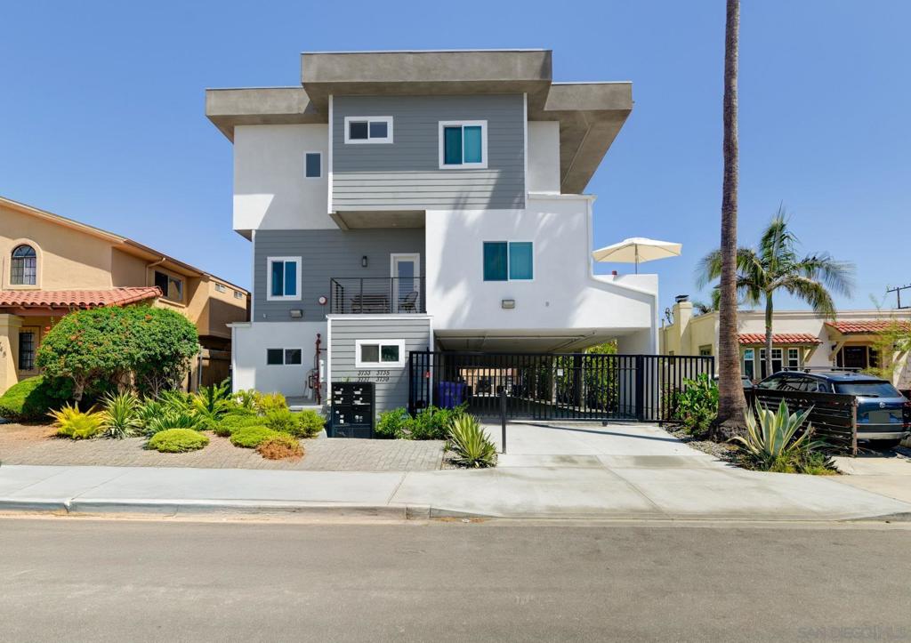 Gorgeous, newer construction end-unit townhome located right in the heart of North Park & walking distance to all that this AMAZING community has to offer! Beautifully designed, expansive & open floorplan features a “great room” layout with dual sliders to a south-facing balcony for exceptional light and creates an ideal indoor/outdoor lifestyle. Designer kitchen w/ Bosch appliances, waterfall quartz countertop & custom cabinetry. Dramatic Floating stair case & cable railing. 10’ ceilings, Exceptional master suite w/ elegant ensuite bath, walk-in closet, auto-blinds & private balcony w/ mountain & city views. Spacious 2 car garage attached w/ storage closet & EV charger off private gated driveway. Amazing opportunity to call home. See it today! Rare opportunity to own a newer construction property in a spectacular location, at the doorstep of all the convenience that North Park has to offer - a walk score of 98! Steps away from amazing restaurants, cafes, breweries, shops, grocery, freeway access, and so much more - Townhome features include designer tile work in the bathrooms, modern-style custom cabinetry & workmanship in the kitchen; Luxury plank flooring; BOSH appliances included as well as full sized Washer/Dryer on top floor; dual pane windows w/ blinds/drapes; high efficiency "on-demand" water heater; gated community; expansive floor plan with high-ceilings; expansive deck off living room with oversized dual slider for maximum space efficiency and light & bright interiors; 3 bedroom layout; plenty of storage space; attached 2-car garage; small complex of only 4 units total. The TOWNHOMES of 31st street - your gateway to the North Park Lifestyle has arrived. Call this beautiful place your new home, today!
