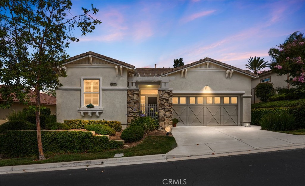 SHOWS LIKE A MODEL HOME!! This is a Beautifully REMODELED & UPGRADED Single Story Home with VIEWS of the Surrounding Hills and Walking Distance to the Golf Course!! Welcome to the Trilogy Lifestyle - The Inland Empire's PREMIER 55+ Community * * This is a the HIGHLY DESIRABLE "Manzanita Model" offering a SPACIOUS Floorplan of 1671sqft with 2 LARGE BEDROOMS, Den/Office (could be 3rd bedroom) and 2 FULL Bathrooms * * Gorgeous ISLAND Kitchen with Corian Counters & Back-Splash, Breakfast Counter for the Grandkids, White Cabinetry, Walk-in Pantry and Breakfast Nook to Enjoy Your Morning Coffee * * Cozy Living Room Surrounded with LARGE PICTURE Windows, Romantic Fireplace and Built-In Media Center * * Wonderful Backyard with Custom Stone Patio & DUAL Covered Sitting Areas, Manicured Landscape, Accent Lighting, Retractable Awning and Views of the Surrounding Hills * * UPGRADED Throughout with Neutral Paint Scheme Throughout, BEAUTIFUL Luxury Vinyl Plank Flooring, HIGH 10FT Ceilings, Crown Molding, Ceiling Fans, Recessed Lighting, Aluma-Wood Patio Cover, Gated Courtyard/Entry, Base Molding, Mirrored Wardrobes, PLANTATION SHUTTERS, Raised Panel Doors and MUCH MUCH MORE * * Spacious Primary Bedroom with PRIVATE Access to your Backyard - AND - Master Bathroom with His & Her Sinks, LARGE Walk-In Closet & Walk In Shower * * Separate DEN, Office or the Perfect CRAFT ROOM with Chair Rail and Hanging Light Fixture that can be your FORMAL DINING ROOM * * INDOOR Laundry Room * * Wonderful Curb Appeal with Gated Courtyard & Entry for Privacy and TWO CAR Attached Garage * * The TRILOGY LIFESTYLE offers Golf, Tennis, Pickleball, Shuffle Board, Amphitheatre, Incredible Gym with an Indoor Track, Lap Pool, Outdoor Resort Pool with BBQs, Spa and Fireplace - Organized Activities & Planned Events!! Beautiful Home, Wonderful Community and Terrific Location...