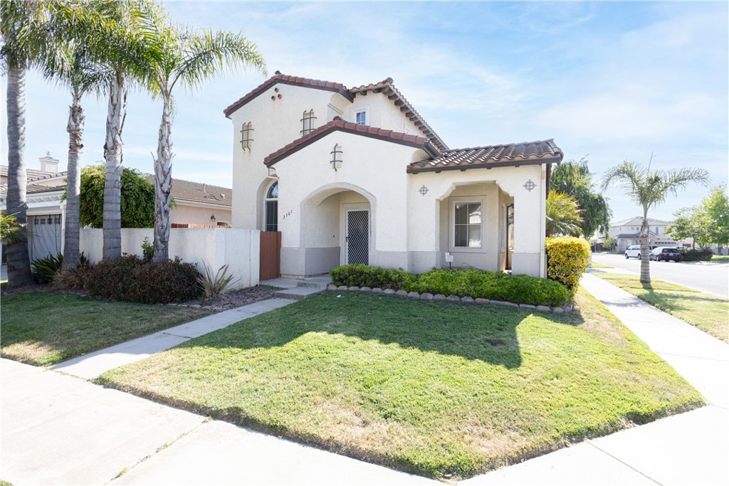 Central Coast Living! Welcome to this beautiful, Spanish Style home on a corner lot in a great neighborhood. Spacious living room with cozy fireplace and vaulted ceilings, letting in plenty of natural light. Also on the main level, you will enjoy a formal dining area, second living area, kitchen with breakfast bar and plenty of storage, 2 large bedrooms, full bathroom, indoor laundry room and access to the attached 2car-garage. The second level features a huge primary suite with private bathroom. Large soaking tub, separate shower, walk-in closet and dual sinks. Fenced patio area wraps around from the front of the home to the backyard with low maintenance landscaping. Great location near shopping and access to the 101 freeway. Schedule a tour today to view this stunning home before it is sold!