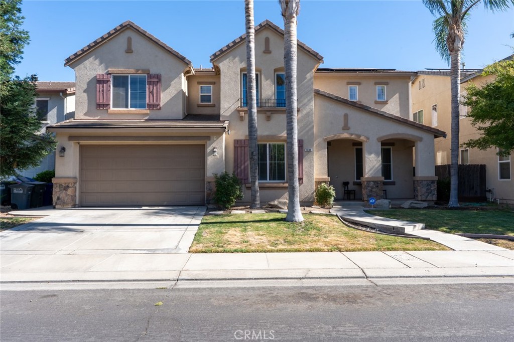 Rare North Merced Gem with Exceptional Space! This spacious home offers the perfect blend of comfort and functionality. Enjoy multiple living areas including a formal living room, separate family room, and a dedicated formal dining room. The open-concept kitchen features a center island, ample countertop space, and room for a large dining table. Downstairs includes a guest-friendly half bathroom, a hallway linen closet, and a convenient storage closet tucked under the stairs. The 3-car tandem garage provides plenty of room for vehicles, storage, or a home gym setup. Upstairs, you’ll find all bedrooms along with a generously sized loft. The oversized primary suite offers enough room for a private sitting area, a large walk-in closet, separate linen storage, dual sinks, a jetted soaking tub, and a walk-in shower. A spacious upstairs laundry room adds ease to your daily routine with built-in cabinets and countertop space. Step outside to your private backyard retreat featuring an above-ground hot tub on a concrete slab. Located just minutes from Merced College, shopping centers, and CatTracks transportation to UC Merced—this home truly has it all!