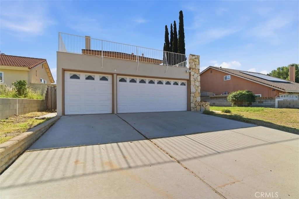 Photo of 29166 Flowerpark Drive, Canyon Country, CA 91387 (MLS # OC26051082)