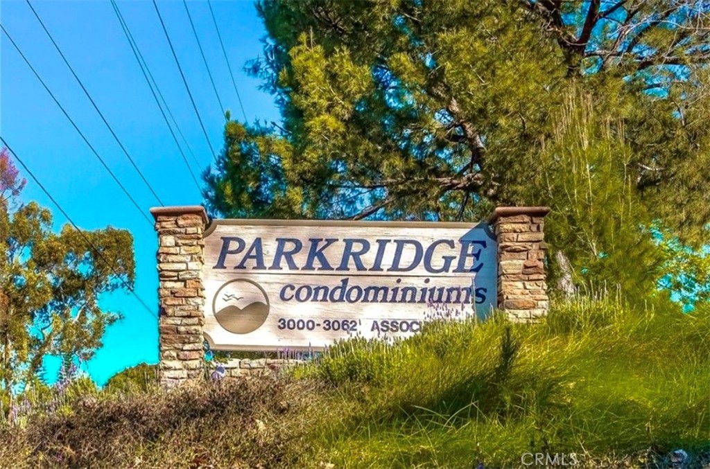 NEW PRICE IMPROVEMENT! Gorgeous 2-bed, 2-bath condo in the tree lined GATED COMMUNITY of Park Ridge in Fullerton. This FHA approved complex features 136 units, a pool, tennis and basketball courts, gym, clubhouse, individual garages and is located directly across the street from Craig Park. This upper-level end unit offers additional privacy and natural light. Features include open floor plan with vaulted ceilings, TWO PRIMARY SUITES, each with it's own bathroom, a large living room, breakfast bar, dining area and detached garage. Great location near Cal State Fullerton, Fullerton College Brea Mall, 57 & 91 freeways, and Downtown Fullerton and Brea! HOA fees include ALL UTILITIES except electric bill. Also it includes fire insurance, gated community, security and common area maintenance. And of course, minutes from Disneyland! Quite and friendly community with an abundance of parking for visitors and second vehicles. New appliances, recently remodeled bathrooms and Vinyl Flooring, recessed lighting and ceiling fans. This complex has an abundance of parking, and being a small community , the neighbors are very easy to deal with. This condo literally has it all!