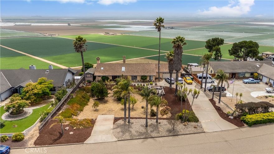 Welcome to this beautiful 2,400 sq. ft. home nestled in the serene bluff of Nipomo. This spacious 3-bedroom, 2-bathroom residence offers a harmonious blend of comfort, style, and natural beauty—with sweeping panoramic views of the lush crop fields in the valley below.



Step inside to find durable and elegant tile flooring throughout, enhancing both aesthetics and easy maintenance. The expansive great room is a true centerpiece of the home, featuring a striking three-sided fireplace that adds warmth and ambiance from every angle—perfect for entertaining or relaxing.



The well-designed primary suite offers a private retreat with a cozy fireplace, creating the perfect atmosphere for winding down. The suite also features a generously sized walk-in closet and a luxurious en-suite bathroom with dual vanities and a spacious walk-in tiled shower.



Outside, the natural beauty of the surrounding agricultural landscape creates a sense of peace and open space, offering breathtaking sunsets and a unique connection to Nipomo’s rural charm.



Don’t miss the opportunity to make this exceptional view property your home—where privacy, space, and scenery come together in one perfect package.