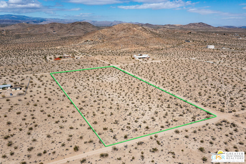 5 Acres with Panoramic Views & Water Meter Included, This flat, 5-acre buildable parcel offers the perfect canvas for your dream home or investment property. With roads on three sides, you'll enjoy both easy access and the assurance of privacy no immediate neighbors building right next to you. Property highlights: Expansive sunrise-to-sunset views Stunning sightlines of both San Gorgonio and San Jacinto mountain peaks Water meter installed at close of escrow nearly $20,000 in savings for the buyer Flat, usable land ideal for building The owner will also consider a land trade near Old Town Yucca Valley. Don't miss this opportunity to secure one of the best-located parcels in the area with utilities ready to go.