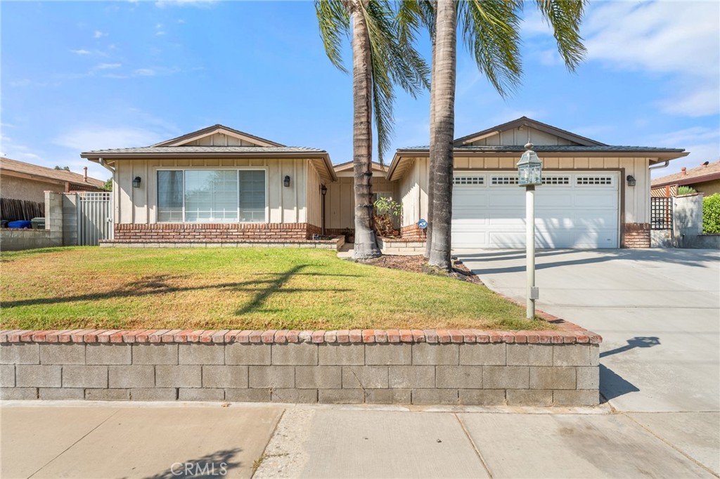 This single-story gem in Upland has it all—2212 sq. ft. of thoughtfully updated living spaces, flexible layouts, and a prime location close to shopping, dining, and recreation.
Step inside to an open, light-filled floor plan featuring wood flooring, cozy fireplace, and shutters throughout, adding charm and a polished touch while letting you control natural light with ease. The kitchen is a true centerpiece with granite counters, stainless steel appliances, and plenty of storage—perfect for everyday living or entertaining.
Both bathrooms have been beautifully renovated, including a spa-like primary ensuite with a large walk-in shower and built-in seat for ultimate comfort. The oversized primary suite serves as a true retreat, complete with a sliding door that opens directly to the backyard, creating a seamless indoor-outdoor flow. Two additional bedrooms are served by a separate AC system, ensuring year-round comfort for guests or family.
This home also features two AC units, plus a vented garage that can easily function as a gym, workshop, or hobby space. Entertain with ease in the oversized family room, complete with a built-in bar, or step outside to enjoy the backyard oasis, which includes two sheds for storage and a built-in gas grill—perfect for dining, entertaining, or relaxing in the California sun.
Location is key: less than a mile from Upland Golf Course, under 3 miles to The Colonies shopping center, and just minutes from vibrant Downtown Upland with its restaurants, shops, and community events.
Enjoy the ease of a single-story home without sacrificing space, comfort, or lifestyle. This home is the perfect balance of style, convenience, and tranquility. Don’t miss your chance to make it yours!