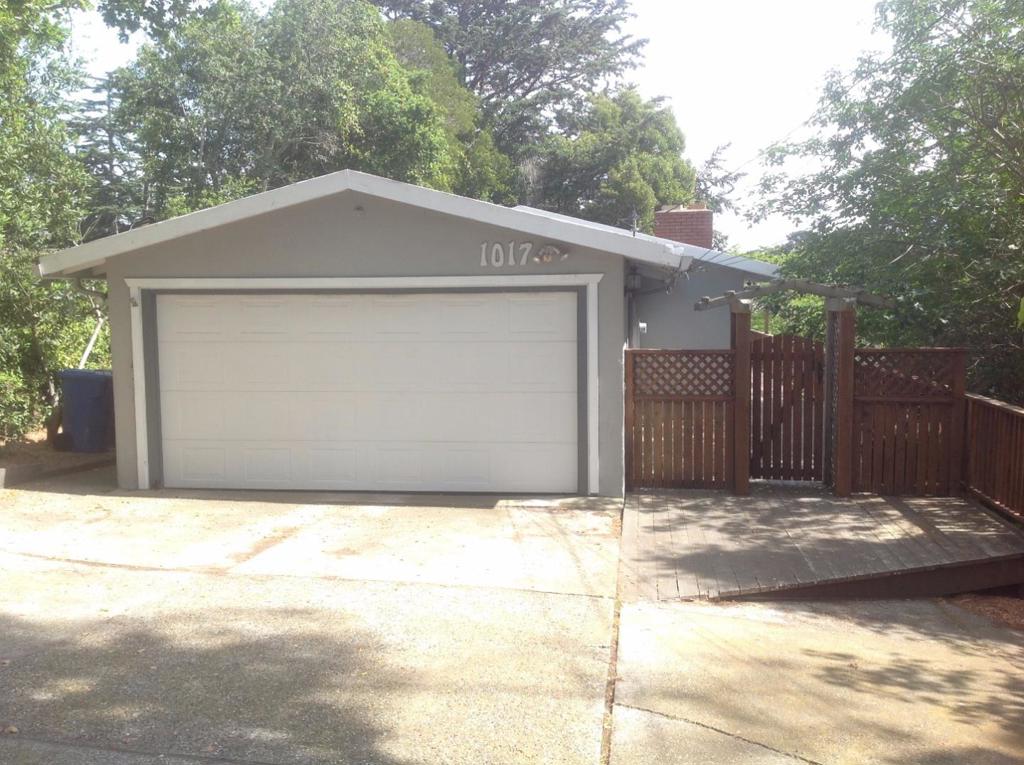 Lovely situated 3 bedroom, 2 bath Monterey home in the trees. Spacious tree filled lot offering complete privacy, yet walking distance to downtown Monterey. Flexible floor plan with lower area master bedroom and bath with outside entrance.