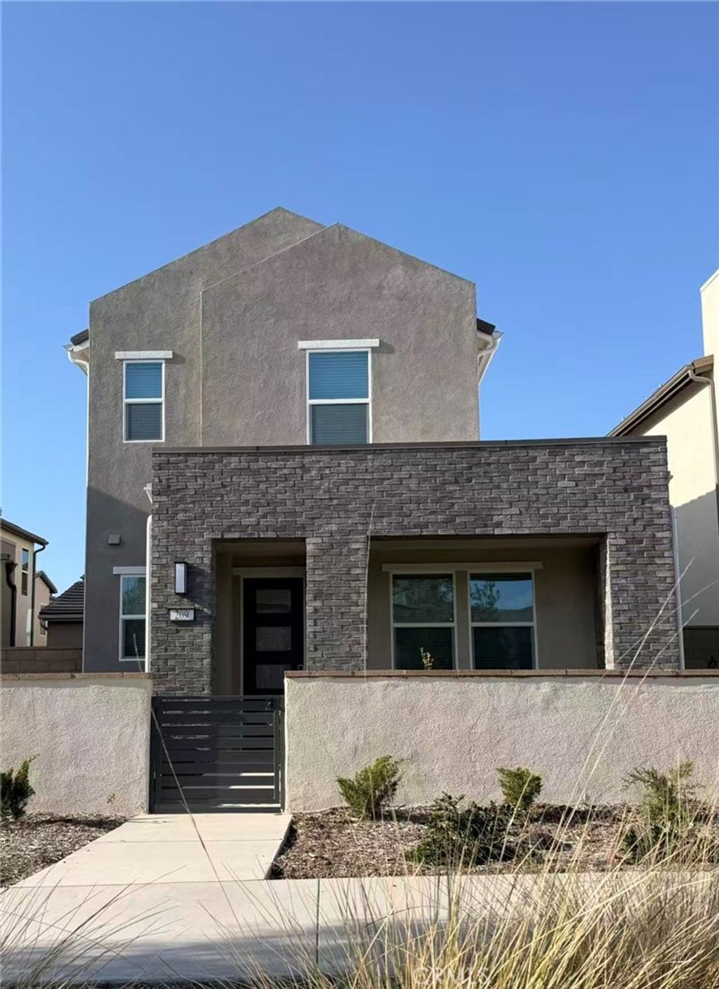 Photo of 209 Longspur, Irvine, CA 92618 (MLS # OC26055059)