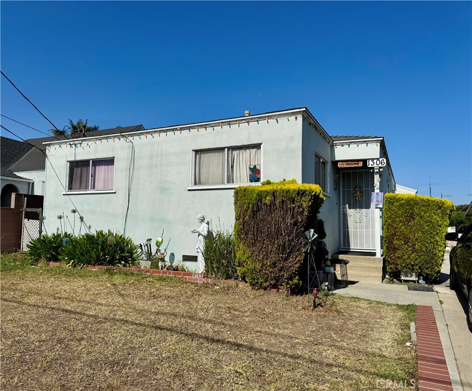 Wilmington Duplex with Value-Add Potential!
Side-by-side duplex offering approx. 1,470 sq ft of living space on a 5,266 sq ft lot. Each unit features a private entrance, spacious layout, and shared driveway leading to a detached 2-car garage. Great opportunity for investors or owner-occupants to customize and enhance. The detached garage offers ADU potential (buyer to verify). Property includes a fenced yard, mature landscaping, and ample off-street parking. Convenient location near schools, shopping, and freeway access. Please do not disturb occupants.