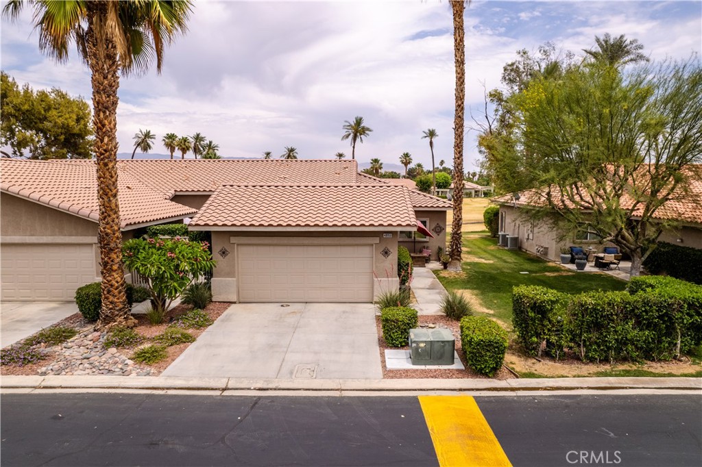 Welcome to your desert retreat in the desirable Indian Palms Country Club! This single-story, 2 bedroom, 2 bathroom condo sits on the golf course with stunning mountain views and is just 2.4 miles from the Empire Polo Fields—home to world-famous events like Coachella, Stagecoach, and the Sand Storm Lacrosse Festival. The home features vaulted ceilings, a spacious primary suite with a private bathroom and double sinks, and an indoor laundry closet for added convenience. A detached 2-car garage offers plenty of storage and parking. Enjoy resort-style living with access to fantastic HOA amenities including pools, spas, pickleball and tennis courts, a fitness center, and a country club ballroom. Plus, you’re just 15 minutes from Fantasy Springs Casino for entertainment, dining, and nightlife. Whether you’re looking for a full-time residence, vacation getaway, or investment opportunity, this property has it all!