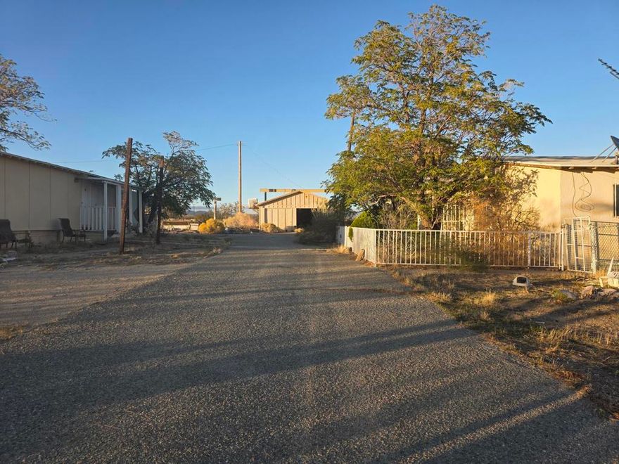 W. Rosamond, Ca.  Address: 6149 105th Street. 🌵 10-Acre Fixer Opportunity in West Rosamond, California!Discover your own private desert retreat.  A rare 10-acre property offering endless possibilities!  Main home and additional ADU. with a few mobile home fixers.  Main home is a 3-bedroom, 2-bath fixer-upper home, a detached garage, There is also an additional ADU 2 Bed / 1 Bath fixer and a few trailer ready for renovation or not.  Whether you're dreaming of building your ideal ranch, workshop, or desert getaway, this property provides the space and freedom to bring your vision to life. Enjoy privacy, tranquility, and wide-open skies perfect for stargazing -- all while having room for your toys, animals, and projects.Property Highlights:10 acres of usable land3 bed / 2 bath home (fixer-upper)Detached garage + 2 Bed/1 Bath ADU.  2 x trailers on site (both need work)Ideal for custom builds, homesteads, or hobby ranchesPeaceful desert location with stunning night skiesGreat opportunity!  Property is a fixer and Sold As-Is. Seller will make no repairs or warranties.. Buyer to conduct their own investigations and due diligence to satisfy themselves  regarding the property's  condition and potential.