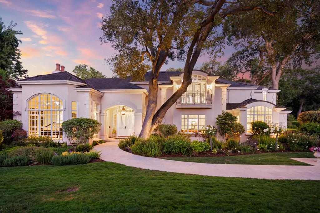 Stunning architectural details, this magnificent estate is classic & timeless outside & eminently chic & sophisticated inside. Crisp white palette, traditionally arranged flowing flr plan w richly hued eucalyptus flrs. Perfect for entertaining, this elegant masterpiece offers a soaring entrance salon, grand formal LR & spac dining room. Remodeled & modernized kitchen w Calacatta marble slab, high-end appliances, large bkfst area, & adjoining open FR for festive gatherings. Temp-controlled wine cellar, walnut-paneled library, fitness room w 1/2 ba & convenient french doors providing the ultimate indoor-outdoor living. 4 upstairs bdrs, each w a beautifully remdl en suite ba incl luxe primary retreat w couture closet, expansive ba complete w large tub under picturesque windows & heated ba floors. Renovated guest house, equally beautiful & perfect for addtl ofc space. Manicured grounds w pool & spa, bbq area, majestic trees & colorful gardens for every season. Excellent Menlo Park schools.