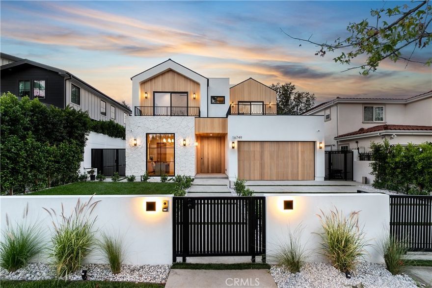 Welcome to this exquisite modern estate, where elegance and functionality meet. Profession and art met again to create this magnificent 6-bed/7-bath house in one of the best neighborhoods in Encino. As you step into this beautiful home, you’re immediately greeted by an open-concept design that flows seamlessly from the entrance all the way to the backyard.

The kitchen has been thoughtfully designed to bring to life a modern organic style. For added convenience, a secondary prep kitchen sits behind the main one, allowing the chef to prepare meals while keeping the main kitchen clean and organized.

The living room is bright and welcoming, featuring a high ceiling and sliding pocket doors that blur the line between indoor and outdoor living. A gorgeous dining area seamlessly pairs with a stylish bar, overlooking the courtyard—perfect for hosting family and friend gatherings. 

The exclusive movie theater offers a true cinematic experience with a professional sound system. 

Moving upstairs, the second floor offers spacious bedrooms with access to oversized balconies that overlook the front and backyards. The master bedroom is a true retreat, featuring a luxurious bathroom. A well-designed walk-in closet features a welcoming ambiance, complete with an elegant makeup vanity for added convenience.

In addition to the main residence, the property includes a spacious 1-bed / 1-bath ADU, complete with its own open kitchen—perfect for guests and extended family.

The outdoor space is an entertainer’s paradise, offering a pool and spa, a built-in barbecue, and integrated sound systems that extend throughout the home and into the yard. 

The house is staged with brand-new, high-quality furniture, and the buyer has the option to keep all or any.