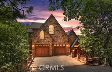 Your Lake Arrowhead Dream Just Became Reality!
Stop scrolling, this is the one you’ve been waiting for! Nestled in the coveted North Shore of Lake Arrowhead, this remodeled gem isn’t just a home, it’s a lake lifestyle.
This home is thoughtfully crafted to harmonize with its surroundings, featuring a spacious open-concept layout that floods with natural light through large windows, highlighting elegant finishes and impeccable craftsmanship throughout. With two master retreats, each equipped with a fireplace and spa tub (including one on the main level), this property is ideal for both relaxing and entertaining.
The gourmet chef’s kitchen, equipped with top-tier appliances, seamlessly connects to the main living area, making it perfect for hosting guests.
Step outside to expansive, multi-level decks ideal for dining and unwinding, all surrounded by serene mountain landscapes. Cozy up to any of the four fireplaces or explore private hiking trails that wind through nearby nature preserves. A short half-mile walk takes you to the lake, where you can enjoy kayaking, boating, or fishing—creating countless memories in your lakeside oasis. Additional features include spa-like bathrooms, Luxury Vinyl Plank floors, new central A/C, ample garage space, and proximity to charming local shops, restaurants, and cultural attractions.
Homes like this, in this location, at this price won’t last. Don’t miss out on one of the most exciting deals to hit the North Shore market. Schedule your private tour today before it’s gone!
This is not your typical mountain cabin.
Be sure to visit the 360 Tour!