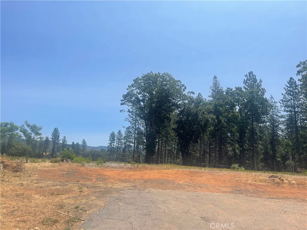 Great lot in north Paradise, ideally located next to the Memorial Walking Trail—perfect for biking or walking through the heart of town. The seller has maintained an active PID account, helping reduce costs and streamline your rebuild. The previous home was a 3 bed, 2 bath with over 1,700 sq. ft., offering valuable rebuild credits. Enjoy life in Paradise where outdoor adventure abounds, with a simple commute to Chico and quick access to Hwy 99 and 70.