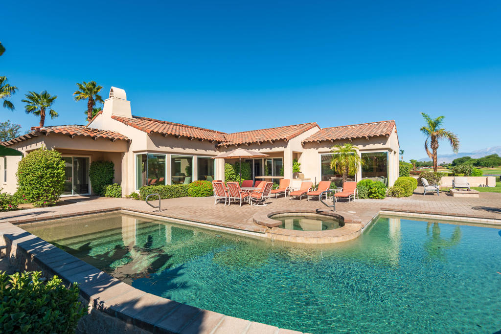 ***AUGUST-DECEMBER RATE $9,000 PER MONTH; JANUARY-APRIL RATE $14,000 PER MONTH***Welcome to your own private desert oasis, where luxurious living meets awe-inspiring natural beauty. Tucked within the highly coveted Mission Hills Legacy neighborhood, this exceptional residence offers a peaceful and elegant retreat in one of the desert's most prestigious communities.From the moment you enter through the guard-gated entrance, you're enveloped in serenity. This expansive home features three spacious en suites and three and a half baths, thoughtfully designed for comfort and entertaining. The gourmet chef's kitchen flows effortlessly into the large family room and wet bar, creating a perfect gathering space for guests and loved ones.Walls of glass showcase breathtaking views of the golf course, tranquil water features, and the dramatic desert landscape--including panoramic vistas of Big Bear, Mount San Jacinto, and the Chocolate Mountains. Whether you're in the living room, family room, or dining room, the beauty of the outdoors is always within view.Step outside to your own resort-style backyard, where the sun-drenched patio features a sparkling pool and spa, built-in BBQ, and a cozy fire pit--perfect for evening gatherings under the stars. This expansive outdoor space invites you to relax, entertain, and take in the unforgettable sunrises and sweeping mountain views that define the desert lifestyle.Come home to Mission Hills Legacy, where elegance, privacy, and stunning natural surroundings create a living experience like no other. Book now to reserve your stay!