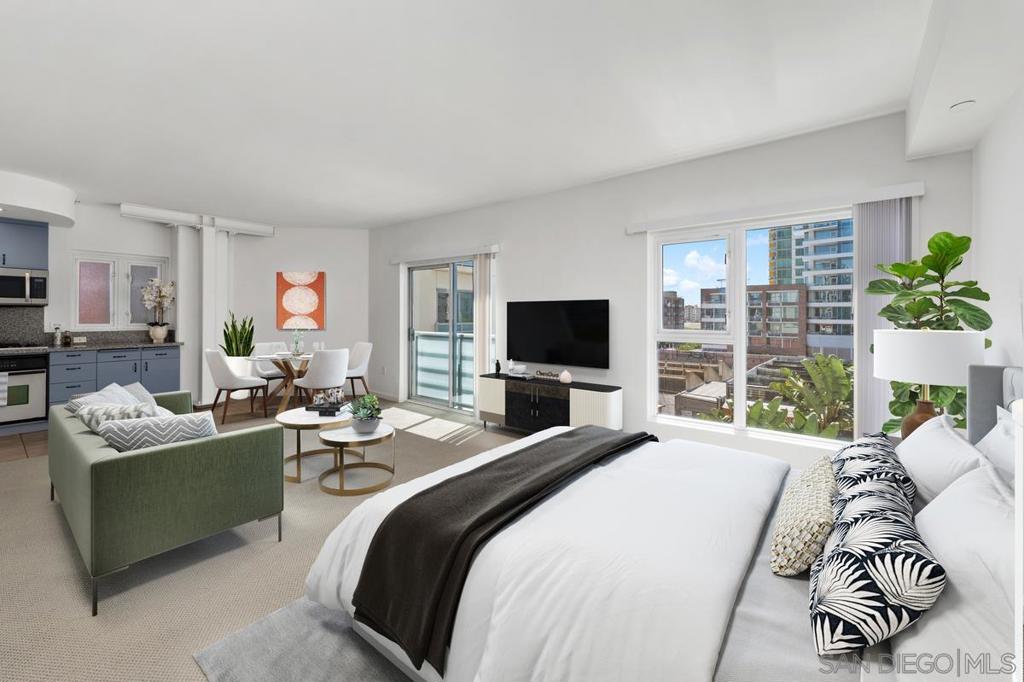 Welcome to this stylish condo at Element in East Village! This move-in ready, light and bright corner unit offers an open floor plan, modern kitchen with granite countertops, and floor-to-ceiling windows that fill the space with natural light. Recently painted with upgraded kitchen and bath cabinets, new hardware, light fixtures, bathroom medicine cabinet, and luxury carpet. Features in-unit stackable laundry and assigned underground gated parking. Enjoy a secure, pet-friendly building with a fitness center and community courtyard with BBQs and fire pit. Located steps from Petco Park, coffee shops, dining, nightlife, and trolley access—perfect for vibrant downtown living!