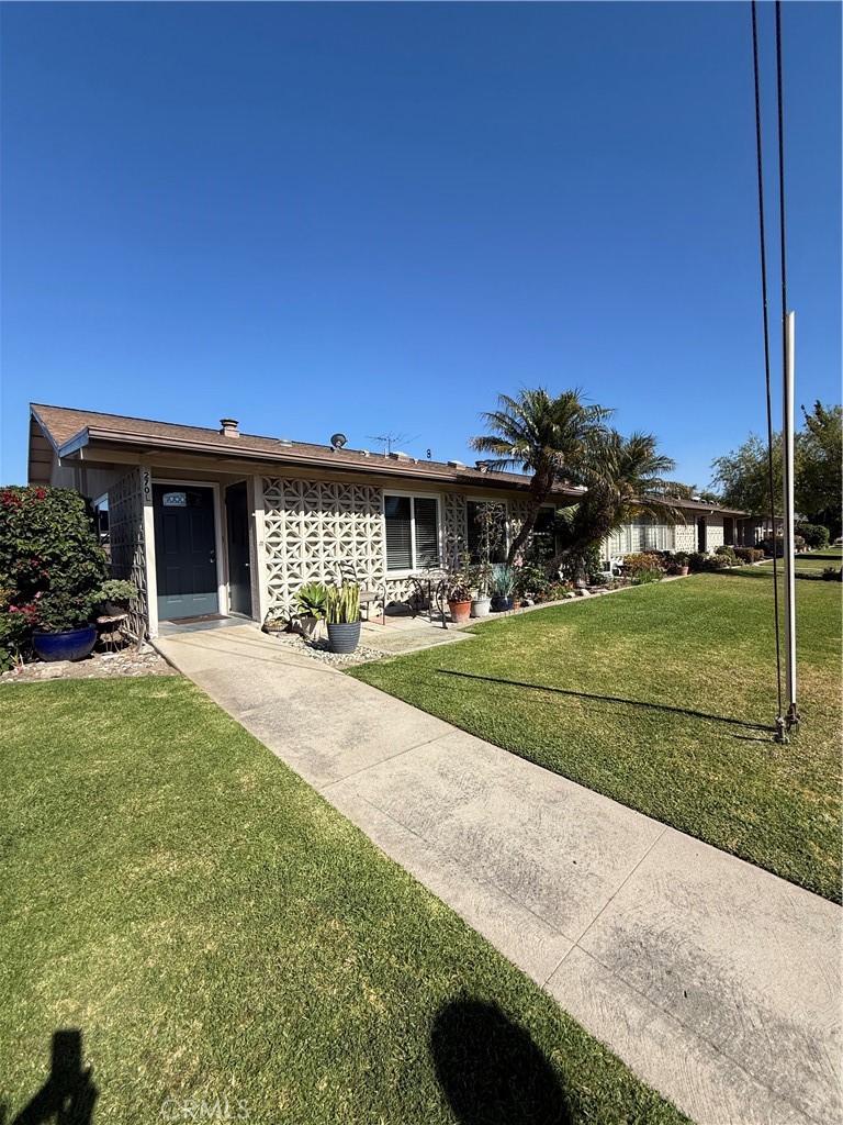 Wonderfully expanded and upgraded 2 bedroom, 1 bath, formal dining room home. The living room is fully expanded with double pane windows, deluxe vinyl plank flooring, a heat pump and air conditioning, and is adjacent to the formal dining room. The kitchen has custom natural wood cabinets, and built in electric appliances including a stove top, oven, refrigerator, dish washer, microwave, upgraded counters, and a sola tube. The main bedroom is expanded and has a walk-in closet, heat pump with air conditioning, double pane windows and is carpeted. The upgraded bathroom features a washer/dryer, custom tile shower, and sola tube. The second bedroom is carpeted and has double pane windows. This lovely home has drive-up parking for your convenience. Stop by and take a look at this special home.