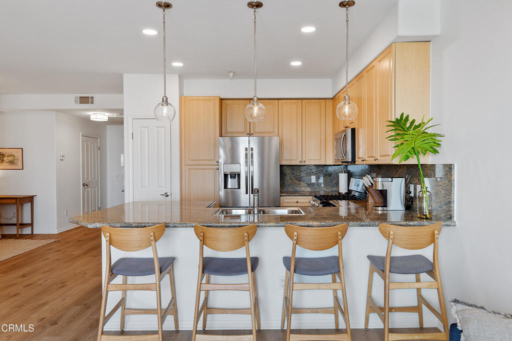 FULLY FURNISHED - MONTHLY RENTAL. 30 day minimum stay - no maximum length of stay... (Available 9/5/2025) Live in the heart of Downtown Ventura - in the 'Poli-Oak Pavilion'! Walk to local restaurants, shopping, Farmer's Market, San Buenaventura Mission, Ojai bike path, Ventura County Fairgrounds and to the Ventura pier and beach! This beautifully appointed ocean view condo features granite counter tops, stainless steel appliances, recently upgraded bathrooms, flooring, lighting and all new furnishings! The 2 bedroom, 2 full bathroom home has been outfitted with contemporary furniture and artful decor, and is equipped with everything you'll need to enjoy your stay including housewares and kitchen essentials, shower and bath supplies, linens, towels and more! Miele stackable washer and dryer - in unit. Enjoy your morning coffee overlooking iconic Downtown Ventura and the Pacific Ocean or enjoy the courtyard with lush landscaping and water features that create a peaceful downtown oasis. The unit is located on the 4th level; however, it is easily accessible by elevator from the secure underground parking garage. Located across the street from the historic City Hall, this home will put you in the center of everything that's fun and exciting in downtown Ventura, not to mention it's just 4 blocks to the beach! All utilities included - water, sewer, trash, gas, electricity, Wi-Fi and cable TV are all part of this fully furnished monthly rental.
