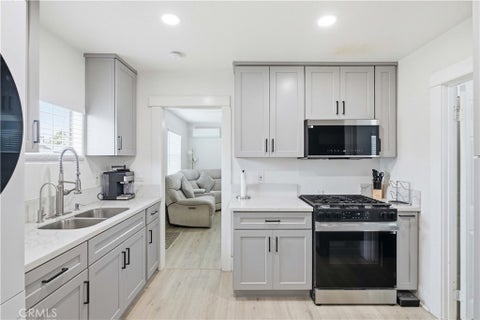 Photo of 5964 S Halldale AVE, Los Angeles, CA 90047 (MLS # DW26136161)