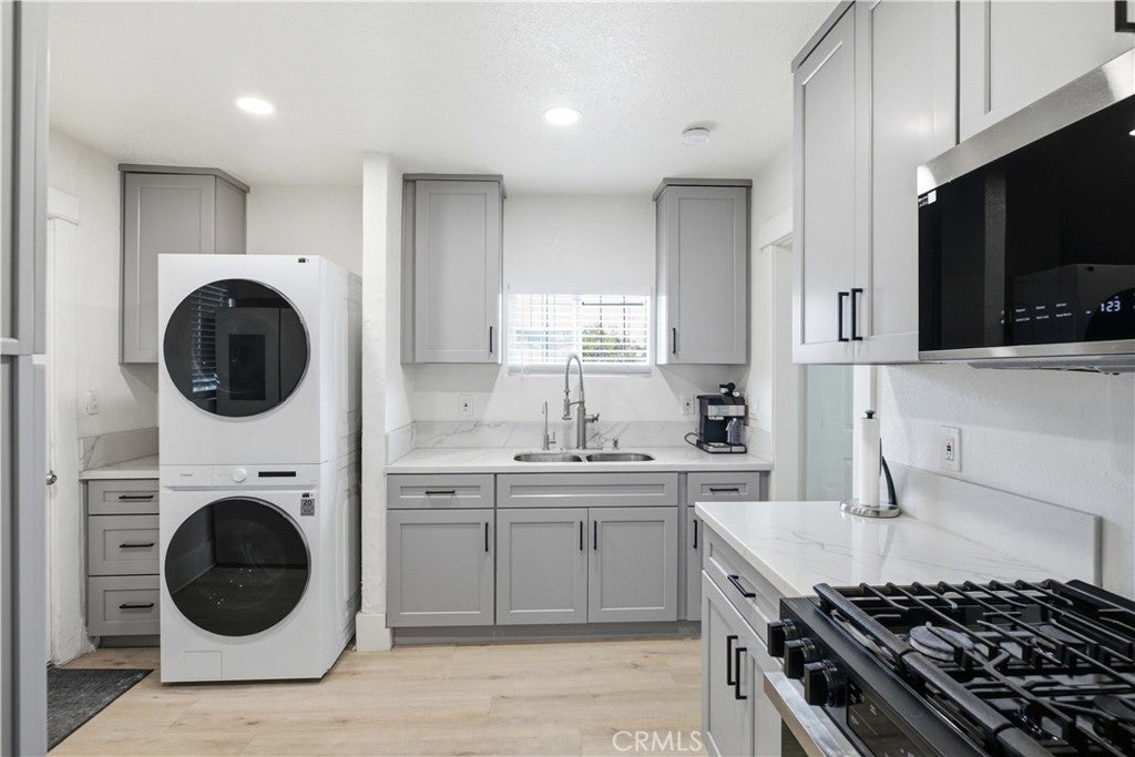 Photo of 5964 S Halldale AVE, Los Angeles, CA 90047 (MLS # DW26136161)