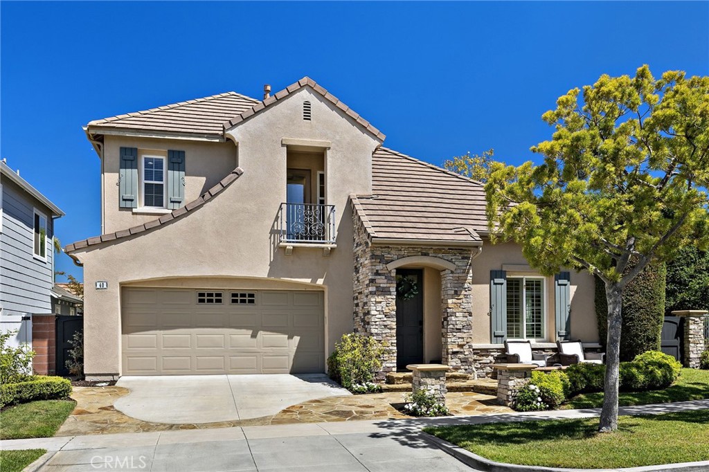 Welcome to this beautifully upgraded 4 bedroom, 2.5 bath corner-lot home in the highly sought-after Canopy Lane tract of Ladera Ranch. With nearly 2,600 square feet of living space and a 3-car garage, this residence blends modern updates with timeless charm.The inviting exterior features updated hardscape finishes, a welcoming front porch, and a private yard—perfect for outdoor relaxation. Inside, you’ll find newer LVP flooring, crown molding, recessed LED lighting, and fresh paint that fill the home with warmth and light. The remodeled chef’s kitchen is a true highlight, boasting quartz counters, large center island, custom finishes, floating shelves, a designer hood, KitchenAid appliances, updated hardware, and custom lighting. The spacious family room, located just off the kitchen, offers a cozy custom finished fireplace with built-in shelving, making it the heart of the home. Additional upgrades include ceiling fans throughout and a recent whole-house repipe for peace of mind. Upstairs, four generous bedrooms provide plenty of space for family or guests. Every detail has been thoughtfully designed to create both comfort and style. This home’s location is second to none—just minutes from Poets Park, Oso Grande Elementary, Founders Park, and the newly renovated water park. With hiking trails, pools, and a vibrant community lifestyle at your doorstep, this neighborhood is truly one of the best places for families to call home.