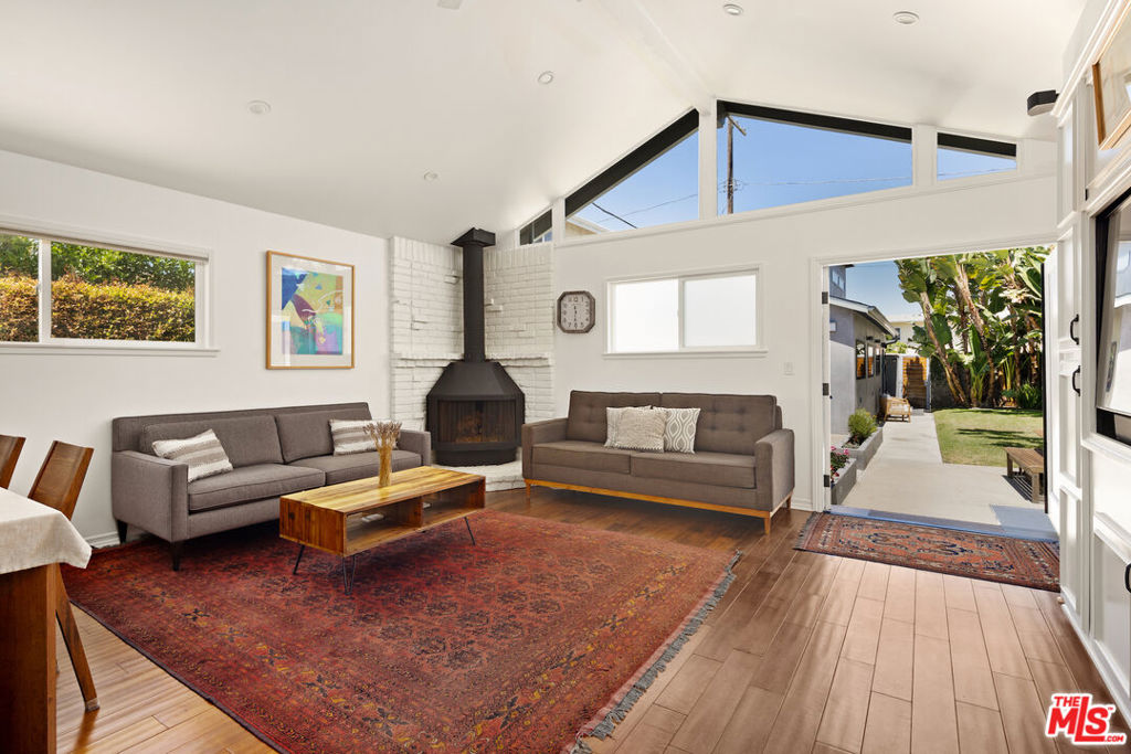 Welcome home to your own private retreat in the heart of Venice. Rare lease offering two homes on a lot, both of which are included in the lease. Whether you live in front and utilize the back house as a detached office, creative studio and/or living space for au pairs, this property boasts incredible versatility and endless possibilities. Both homes are adorned with mid-century modern accents, flooded with incredible natural light and have great indoor-outdoor flow. The front house is a chic single-story bungalow with 2 bedrooms, 2 bathrooms, and a 3rd bonus room that can be used as an extra bedroom, office, or playroom. Enjoy modern amenities such as central A/C and heat controlled by the Nest, a Ring doorbell, and keyless lock entry. Spacious master bathroom with spa shower and dual vanity sinks. The kitchen has new stainless steel appliances and an abundance of counter & storage space. The living room opens up to a fully-fenced, private back yard with mature landscaping and an outdoor dining/patio area. Detached from the main house lies a sophisticated modern studio/Guest house featuring a large bathroom, upstairs lofted bedroom, a full kitchen with top-of-the-line appliances, custom wood cabinets, Fleetwood windows and separate W/D. The guest house has a separate entrance and is approx 900 square feet. Across the street from Zinque, and walking distance Lincoln/Rose, Abbot Kinney, Penmar Golf Course, Ralph's, Whole Foods, Starbucks and the beach. Fully furnished and equipped with everything you need to make the most of SoCal living this is a rare opportunity that is not to be missed!