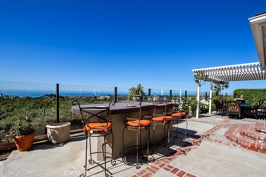 180 DEGREE OCEAN VIEW! From the moment you walk through the door, you'll love the fantastic view of the ocean sunsets!! Beautiful single story home, with sit down ocean views, located in the highly desirable Coast Development. The home has a beautiful open floor plan! French doors from the family room, kitchen and master bedroom lead out to the patio for outdoor living. You'll love entertaining in this home with its open and upgraded kitchen. Located in a quiet neighborhood on a double cul-de-sac.