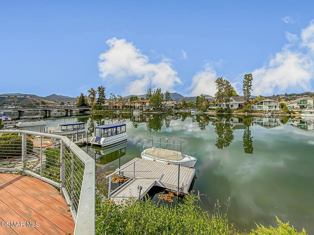 Waterfront Single-Story home in Desirable Northshore. Three bedrooms, two bathrooms, remodeled with amazing deck offering main channel and mountain Views.Primary bedroom with walk in closet, secondary bedrooms with walk in closets as well. One bedroom has Murphy Bed for great functionality. Open living, vaulted ceilings, separate dining area and kitchen with Bay window. Direct two car garage access and gated front yard. Private dock and community offers beach, club house, amazing pool/spa and lush landscape and walking paths.
