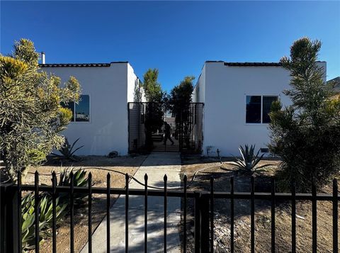 Photo of 1018 E 79th Street, Los Angeles, CA 90001 (MLS # DW25203304)