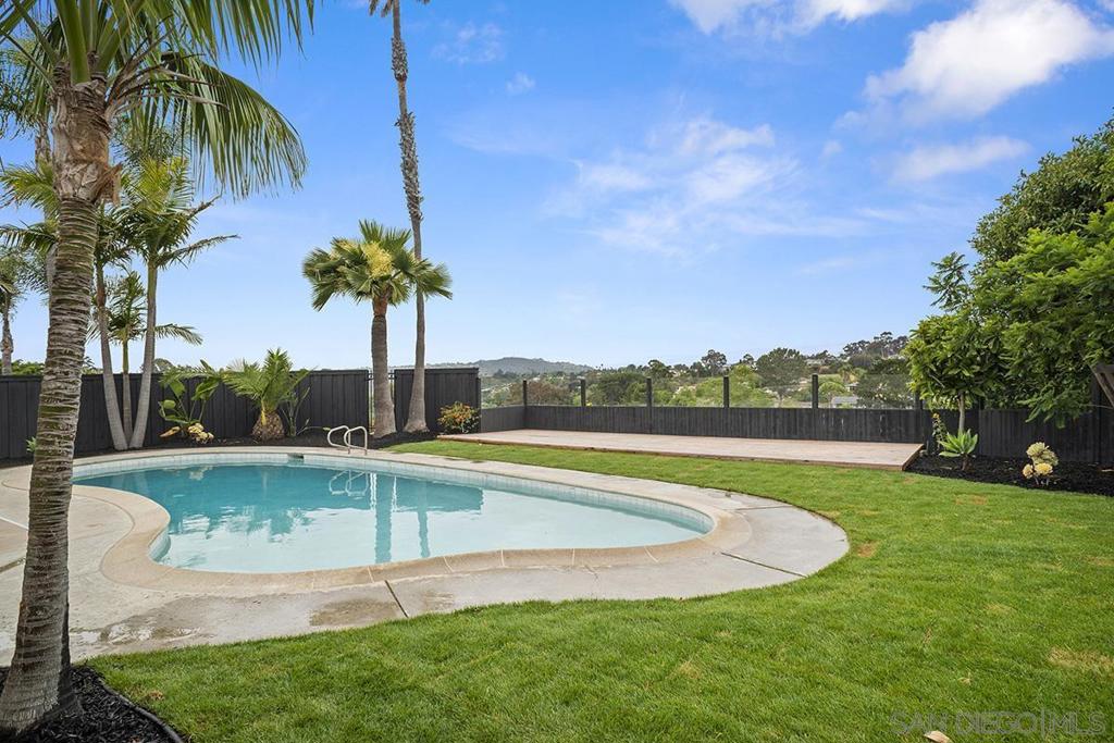 Welcome to this once-in-a-generation lot with forever views on a quiet cul-de-sac in University City! This completely reimagined 4BR/3.5BA home (including 2 primary suites—one on each level) has been completely redesigned as a high-end lifestyle property with seamless indoor/outdoor living. The 2,024 sq ft residence sits on an expansive 11,200 sq ft lot and features wide plank engineered hardwood floors throughout, shiplap ceilings, crown molding, smooth texture walls, and oversized baseboards. The custom kitchen includes high-end cabinetry, porcelain slab countertops & backsplash, 42" Dacor built-in fridge, 48" range, 30" microwave drawer, and Thermador dishwasher. A 16' sliding door opens to a Pebble Tech pool, new tile, view deck, sod, and irrigation. Additional upgrades: new HVAC, electrical panel, LED lighting, stucco, interior shaker doors, two laundry areas, and more. Prime location near La Jolla, UCSD, beaches, shopping, dining, and major employers. Walking distance to excellent schools, parks & hiking trails. Truly a rare and stunning home you won’t want to miss!