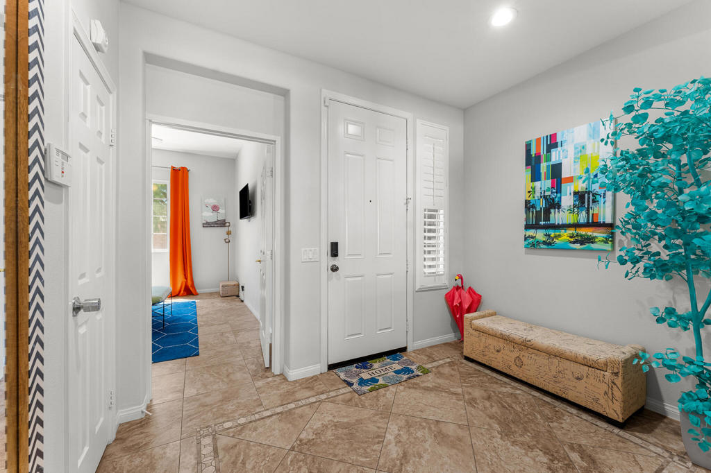 Welcome to Terra Lago in Indio! This stunning 4-bedroom, 2-bathroom single-level home is currently operated as a successful Airbnb and offers excellent short-term rental income potential--a rare opportunity in a community that allows STRs.Step inside to find an open floor plan with soaring 10 ft. ceilings, creating a spacious and inviting atmosphere. The home is being offered unfurnished but can negotiate making it turnkey for investors or those seeking a ready-to-enjoy vacation retreat.Outdoors, enjoy a brand-new pool and spa, dual fire pit, and desert landscaping designed for minmal maintenance. Recent upgrades include brand-new solar panels and an EV charger in the garage.Located on a private cul-de-sac, this home provides both seclusion and easy access to the many resort-style amenities Terra Lago offers. The guard-gated community boasts a 20-acre lake. Residents also enjoy a clubhouse with billiards and ping pong, a library, fitness center, and a community pool and spa.Perfectly located for festivals and the total desert expierience. Don't miss your chance to own a premier short-term rental property in Terra Lago!