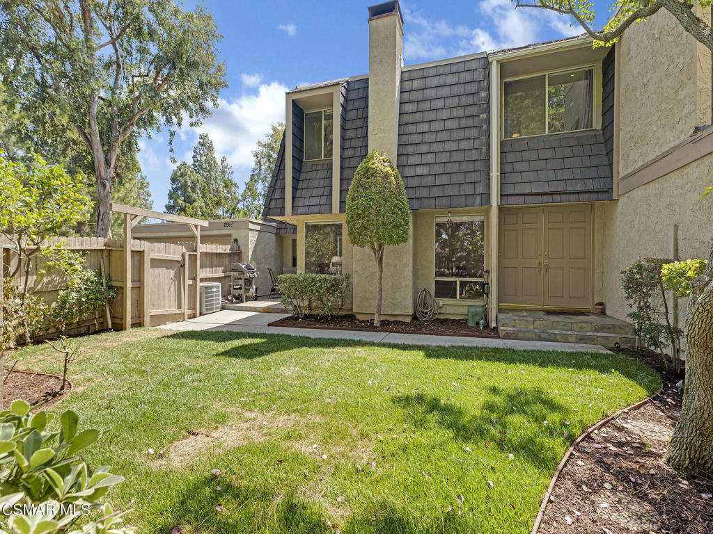 Welcome to this beautifully upgraded Northwood townhome, filled with natural light and charm. Step inside to discover elegant tile flooring and a spacious living room accented by wood-beam ceilings and a stunning stone-lined fireplace. The open-concept layout offers a versatile dining area or family room, seamlessly connected to an updated kitchen featuring granite countertops, tile floors, and recessed lighting. A convenient indoor laundry area and a stylish half bath with tile countertops complete the main level. Upstairs, you'll find a full bathroom for added convenience. Three well-appointed bedrooms, including an oversized primary suite that boasts a private balcony with peaceful views, a walk-in closet with a built-in laundry chute, and an open-concept master bath. The hallway also features a full bathroom for added convenience. Enjoy the lush front yard with a manicured lawn and space for gardening and flowers. Additional highlights include a two-car garage, central heating and air conditioning, and access to community amenities such as pools, spas, tennis and sports courts. Ideally located near scenic hiking and biking trails, beautiful parks, award-winning schools, shopping, dining, and more, this townhome truly offers the best of Thousand Oaks living.