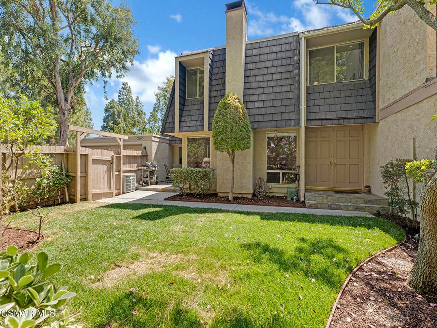 Welcome to this beautifully upgraded Northwood townhome, filled with natural light and charm. Step inside to discover elegant tile flooring and a spacious living room accented by wood-beam ceilings and a stunning stone-lined fireplace. The open-concept layout offers a versatile dining area or family room, seamlessly connected to an updated kitchen featuring granite countertops, tile floors, and recessed lighting. A convenient indoor laundry area and a stylish half bath with tile countertops complete the main level. Upstairs, you'll find a full bathroom for added convenience. Three well-appointed bedrooms, including an oversized primary suite that boasts a private balcony with peaceful views, a walk-in closet with a built-in laundry chute, and an open-concept master bath. The hallway also features a full bathroom for added convenience. Enjoy the lush front yard with a manicured lawn and space for gardening and flowers. Additional highlights include a two-car garage, central heating and air conditioning, and access to community amenities such as pools, spas, tennis and sports courts. Ideally located near scenic hiking and biking trails, beautiful parks, award-winning schools, shopping, dining, and more, this townhome truly offers the best of Thousand Oaks living.
