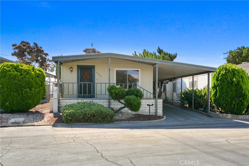 Welcome to The Fountains – A Prestigious 5-Star 55+ Community in La Verne!
This charming and spacious 2-bedroom, 2-bathroom double wide home is move-in ready and waiting for its next owner!
Freshly painted inside and out, this home shines with a bright living room and an inviting dining area complete with a built-in china cabinet. The kitchen is thoughtfully designed with a porcelain sink, gas cooktop, oven, and a convenient breakfast bar—perfect for everyday dining. A separate laundry room includes a washer and dryer with direct access to the carport.
Recent improvements include a metal roof with fresh acrylic coating for long-lasting protection, plus professionally cleaned carpets and vinyl flooring, making this home feel fresh and well cared for.
The primary suite offers a relaxing soaking tub, while the second bedroom is located near the hall bath for added convenience. Parking is effortless with a driveway that accommodates up to three cars. The low-maintenance yard provides space for gardening and a patio, while the welcoming front porch showcases stunning San Gabriel Mountain views.
Life at The Fountains means more than just a home—it’s a lifestyle! Residents enjoy a pool, spa, gym, shuffleboard, and a multipurpose room that hosts social gatherings throughout the year.
** Details You’ll Love:
Laundry room with washer & dryer included.
Easy-maintenance yard & patio space.
Front porch with San Gabriel Mountain views.
Covered parking for up to 3 cars.
Home is on Local property tax .
Space rent: $1,520/month (buyer must qualify with income 3x space rent)
** Bonus: Take a virtual walk-through!
(Click on the 360° tour under the map to explore this beautiful home online.)
Don’t miss this opportunity to retire in style at The Fountains—schedule your private showing today!