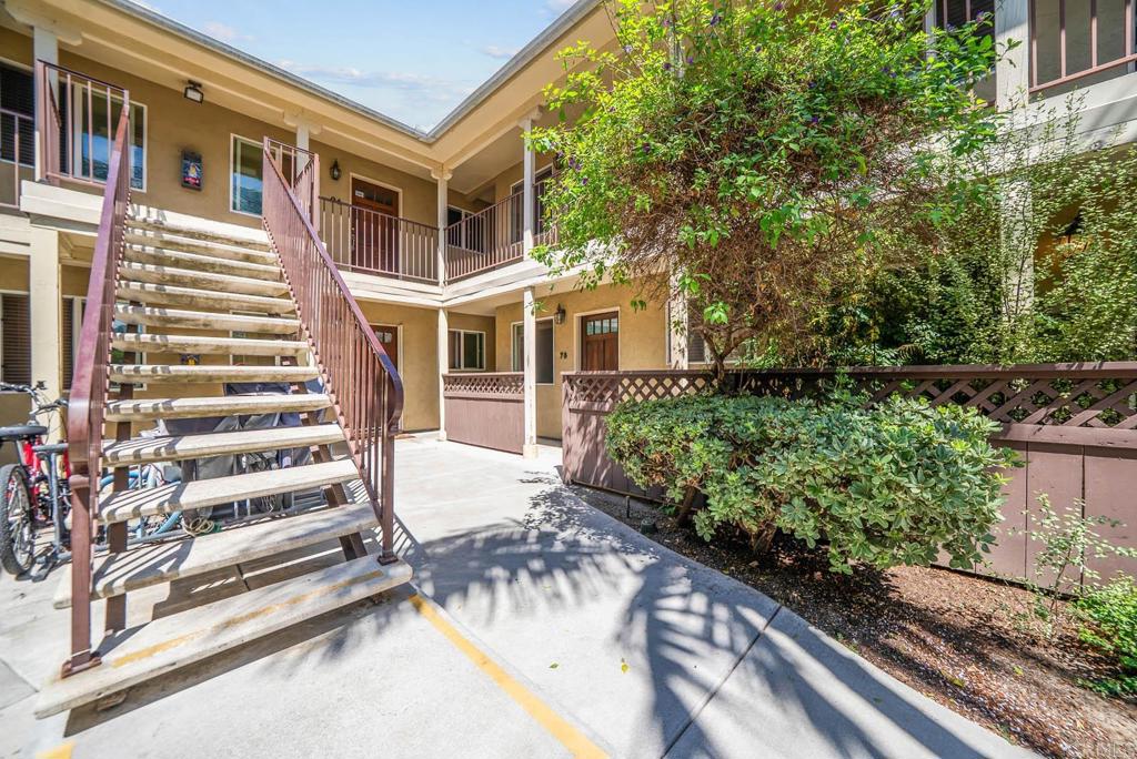 Darling centraly located gated condo within walking distance of public transportation, restaurants and supermarket. This move in ready unit can be financed using VA, FHA and conventional programs. It is a street level entry unit with both a front porch and a rear balcony as an added premium. HOA includes water, trash, and sewer, community swimming pool and gated parking. Laundry room within the complex.