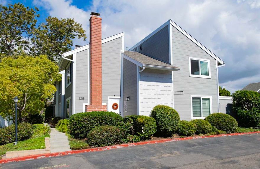 Welcome to your own corner of paradise—West of the 5 in the heart of Carlsbad Village! Nestled between the Pacific Ocean and Buena Vista Lagoon, this charming corner-unit townhome captures the essence of coastal living, with ocean breezes and peaceful views. The light-filled interior features vaulted ceilings, an inviting living room with fireplace, and an upgraded kitchen with granite countertops, dining area, and plenty of storage. The kitchen and living spaces flow seamlessly to a private patio—perfect for morning coffee or relaxing by the fire pit with a glass of wine.  Recent upgrades include double-pane windows for energy efficiency, a newer refrigerator, dishwasher, garbage disposal, microwave, and water heater. The private patio has been thoughtfully improved to create a relaxing outdoor retreat, perfect for morning coffee or evening gatherings. The garage has also been updated with new shelving for additional storage and organization.   Upstairs, expansive windows in the primary suite offer peek ocean and lagoon views that make every day feel like a vacation. Two additional spacious bedrooms provide abundant natural light and flexibility for children, guests, or home office. Complete with a finished one-car garage attached to the patio, plus an adjacent, assigned parking space, this home is just a short stroll to Carlsbad’s beaches, shops, theater, art gallerys, and fine dining. This low-density community is located in the heart of Carlsbad's award winning school district. This is Coastal Village living at its finest.