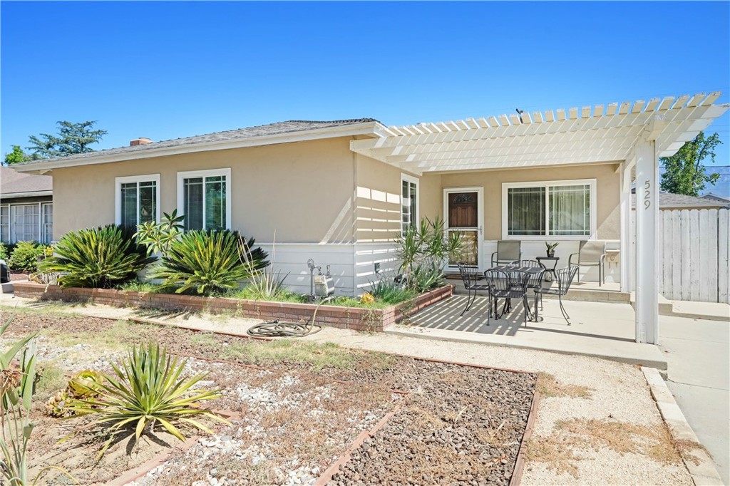 A beautifully maintained 3 Bed, 1.5 Bath home that blends comfort, style, and functionality! This inviting residence features an open floor plan with warm wood flooring, recessed lighting, and abundant natural light throughout. The cozy living room boasts a stunning brick fireplace, perfect for relaxing evenings. Large sliding glass doors lead to the backyard, offering seamless indoor-outdoor living. The dining area is thoughtfully placed, creating a welcoming atmosphere for gatherings. The updated kitchen features sleek countertops, white shaker cabinets, stainless steel appliances, and a chic tile backsplash. A convenient breakfast bar connects the kitchen to the living area, making it perfect for entertaining. This home is conveniently located near shopping, dining, and parks, offering both comfort and convenience. Don’t miss your opportunity to own this charming home in the heart of Ontario—schedule a showing today! Broker and agents do not represent or guarantee the accuracy of the square footage, income, expenses, condition, development potential, bedroom/ bathroom count, lot size or lot lines, dimensions, permitted or non-permitted spaces, or school eligibility. Buyer is advised to independently verify the accuracy of all information with appropriate professionals. There are no warranties or guarantees, buyer to rely solely on his/her/their own findings.