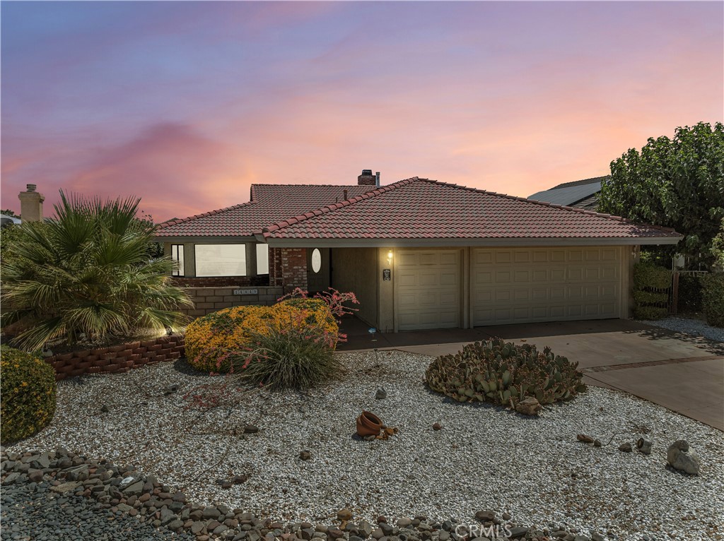 Lakefront Living at Its Finest in Silver Lakes! Well-maintained lakefront home located on a channel in the Silver Lakes community, nestled between Barstow and Victorville in the peaceful high desert town of Helendale. Since ownership, the kitchen and master bathroom have been remodeled, adding to the home's comfort and functionality. The open floor plan features spacious living and dining areas, a stone fireplace, wet bar, and a large, covered patio with stunning lake views—ideal for both entertaining and everyday living. Additional features include tile flooring, quality window coverings, ceiling fans, and a landscaped front courtyard. Silver Lakes offers an exceptional lifestyle with amenities including a 27-hole PGA-rated golf course, two private lakes for boating and fishing, a beach and boat launch area, clubhouse, fitness center, tennis and pickleball courts, RV parking, and an equestrian center. This lakefront property combines comfort, space, and access to resort-style amenities in a welcoming and well-kept community.