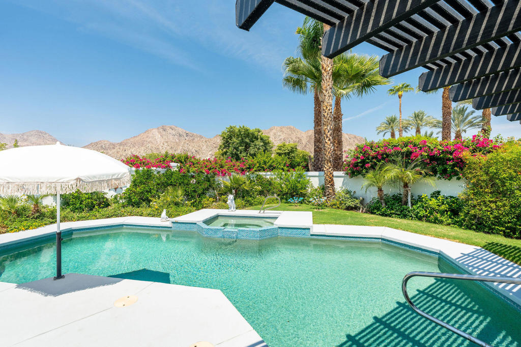 Don't miss this fantastic opportunity to lease (31 days +) residence in Lake La Quinta! Available now for short-term stays as follows: Jan-May $9,500 per month, June-August $7,000 per month, September-December $9,000. Fully furnished. Privately located on a cul-de-sac, this charming residence offers 3 bedrooms, 2 bathrooms, and a thoughtfully designed layout perfect for extended stays. Spacious master suite with a king-size bed, walk-in closet, and dual vanities. Guest Bedroom 2: queen-size bed, and Guest Bedroom 3: queen-size bed plus a bunk bed - ideal for families or guests. Open-concept kitchen with quartz countertops, ample cabinetry, and stainless steel appliances. Washer and dryer included for your convenience. Step outside to enjoy breathtaking mountain views that frame the expansive backyard, featuring a sparkling pool and spa, a covered patio ideal for entertaining, and impeccably landscaped grounds. This premier gated community offers a recreational lake, stunning views, a manned gate, and security patrol. The Chateau restaurant is within walking distance and offers dining with patio seating overlooking the lake. $400 cap on utilities paid by the landlord; any amount over will be the tenant's responsibility. $300 non-refundable cleaning fee. The security deposit varies depending on the month. Call or text Sylvia (760) 799-5953 for a showing.