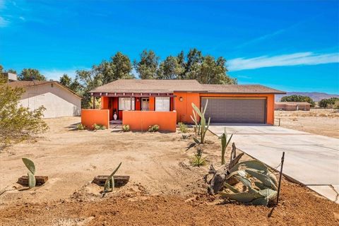 Photo of 73627 Raymond Way, 29 Palms, CA 92277 (MLS # JT25266553)