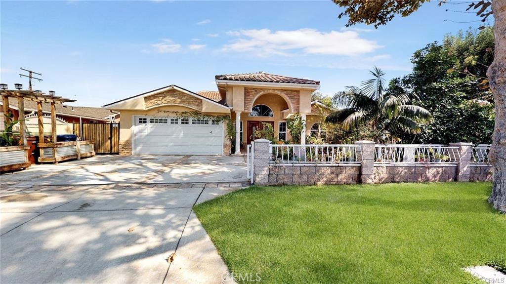 Welcome to this stunning Mediterranean-style home located in the highly sought-after Hacienda Heights area. This glamorous residence offers a seamless and elegant transition as you step into its spacious 5-bedroom, 3-bathroom layout, featuring a dramatic high-ceiling entry and an open, well-designed floor plan.
The interior boasts luxurious travertine and marble flooring throughout the dining room, living room, kitchen, hallways, and bathrooms. Each of the five bedrooms offers generous space and comfort, while a versatile upstairs loft provides a large open area perfect for use as a media room, family room, additional bedroom, or a vibrant children's playroom.
The beautifully landscaped front yard is filled with lush greenery, and the expansive backyard is an entertainer’s dream—complete with a sparkling swimming pool, relaxing jacuzzi, and ample space for outdoor gatherings or weekend BBQs. This home effortlessly combines indoor elegance with outdoor living, creating the perfect setting for both everyday living and entertaining.