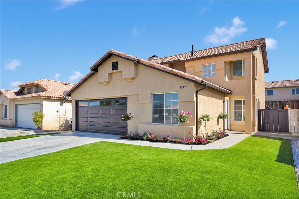Welcome to your DREAM HOME— a FULLY RENOVATED gem tucked in the heart of Foxfire Ranch community! This stunning two-story beauty has been thoughtfully reimagined TOP TO BOTTOM with on-trend upgrades and modern comforts that buyers are craving. Step inside and fall in love with the light, bright, and airy floor plan featuring BRAND NEW TILE FLOORING, NEW FRESH EXTERIOR & INTERIOR PAINT, and a NEW DESIGNER-INSPIRED KITCHEN with BRAND NEW SLEEK CABINETS, NEW LUXURIOUS QUARTZ COUNTERTOPS, NEW STAINLESS STEEL DISHWASHER and a NEW STAINLESS STEEL STOVE that will make cooking a joy! All of it shines under NEW ELEGANT MODERN CEILINGS & FIXTURES—plus STYLISH NEW VANITY in all the bathrooms for that extra WOW factor. This home checks every box with one BEDROOM DOWNSTAIRS — perfect for guests, in-laws, or a home office. Head upstairs to your PRIVATE PRIMARY SUITE, complete with its own cozy FIREPLACE and relaxing ensuite & updated bathroom — a true owner’s retreat! You’ll love the curb appeal with a BRAND NEW GARAGE DOOR, NEW FRONT YARD TURF, low-maintenance SHRUBS & FLOWERS, and a NEWLY REFRESHED BACKYARD that’s perfect for entertaining or winding down under the covered patio. Located in the sought-after Foxfire Ranch neighborhood near top-rated schools, parks, shopping, and with EASY ACCESS TO THE 15 FREEWAY—this home is THE ONE you’ve been waiting for. TURNKEY. MODERN. GORGEOUS. Don’t wait—schedule your private showing before someone else scoops it up!