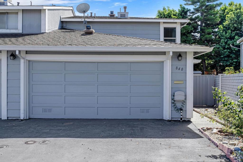 Welcome to this beautiful end-unit townhome nestled in the highly sought-after Washington Manor community. This 2-bedroom, 2-bathroom gem offers a spacious open-concept layout filled with natural light, enhanced by recessed lighting, dual-pane windows, and elegant laminate flooring throughout. The remodeled kitchen is a true highlight, featuring granite countertops, a full granite backsplash, stainless steel appliances, and a convenient breakfast bar—perfect for both everyday living and entertaining. Enjoy the privacy of your own fenced backyard, a generous side yard with a large storage shed, and an attached 2-car garage with interior access. Enjoy the community amenities, including a sparkling pool, clubhouse, and plenty of guest parking. With a low HOA that covers water, sewer, insurance, and exterior maintenance, this home offers incredible value. Prime location! Just minutes from BART, major freeways, shopping, dining, and scenic bay trails—perfect for commuters and nature lovers alike.
