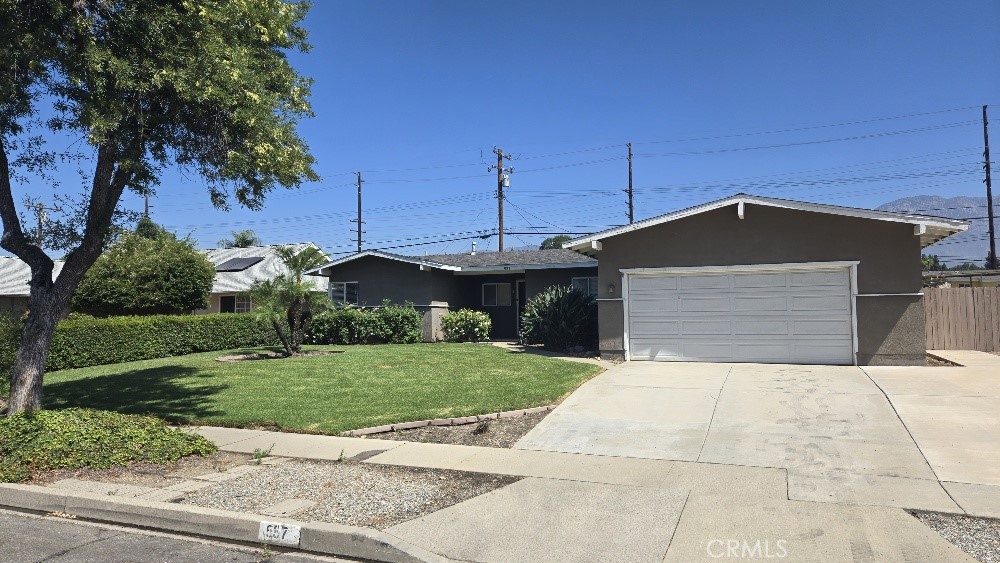 Charming 50's style single-story 2-bedroom, 2-bath home in quiet Upland neighborhood. Kitchen has gas cook top and built-in double ovens. Wood flooring, ceiling fans, cozy brick fireplace. Office can be used as a 3rd bedroom. Close to 10 freeway and parks. Gardening included. Submit for pet approval. No smoking allowed. Renter’s insurance required.